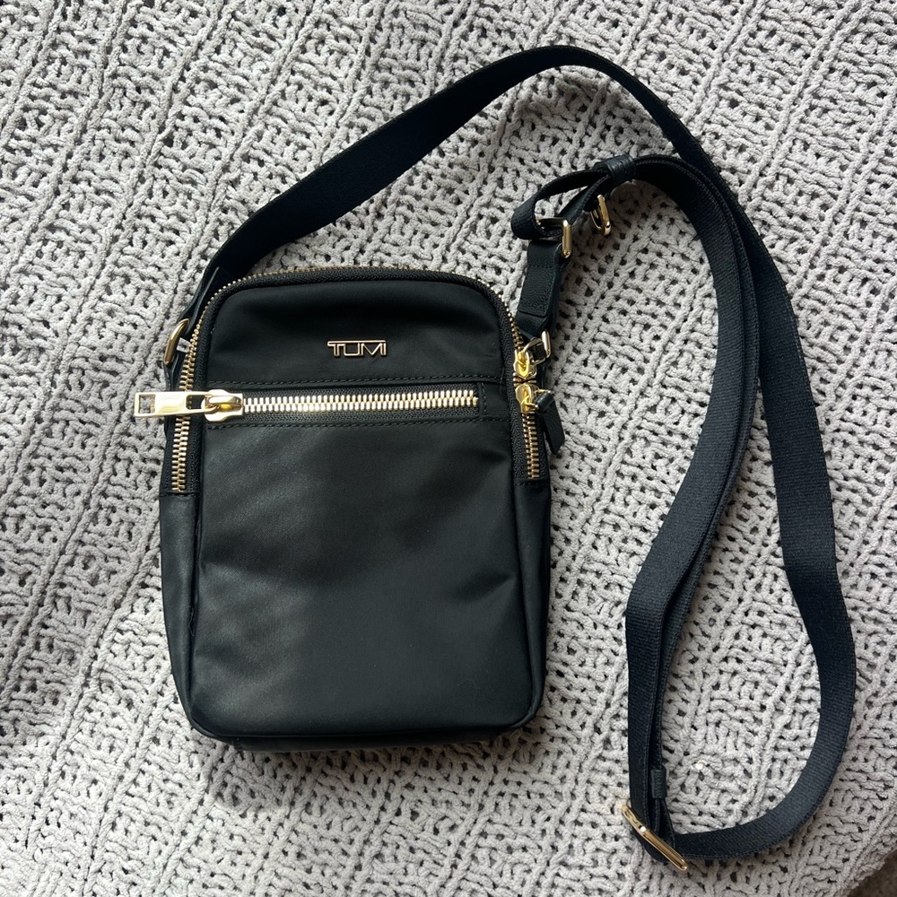 TUMI Black Messenger Bag with Gold Accents